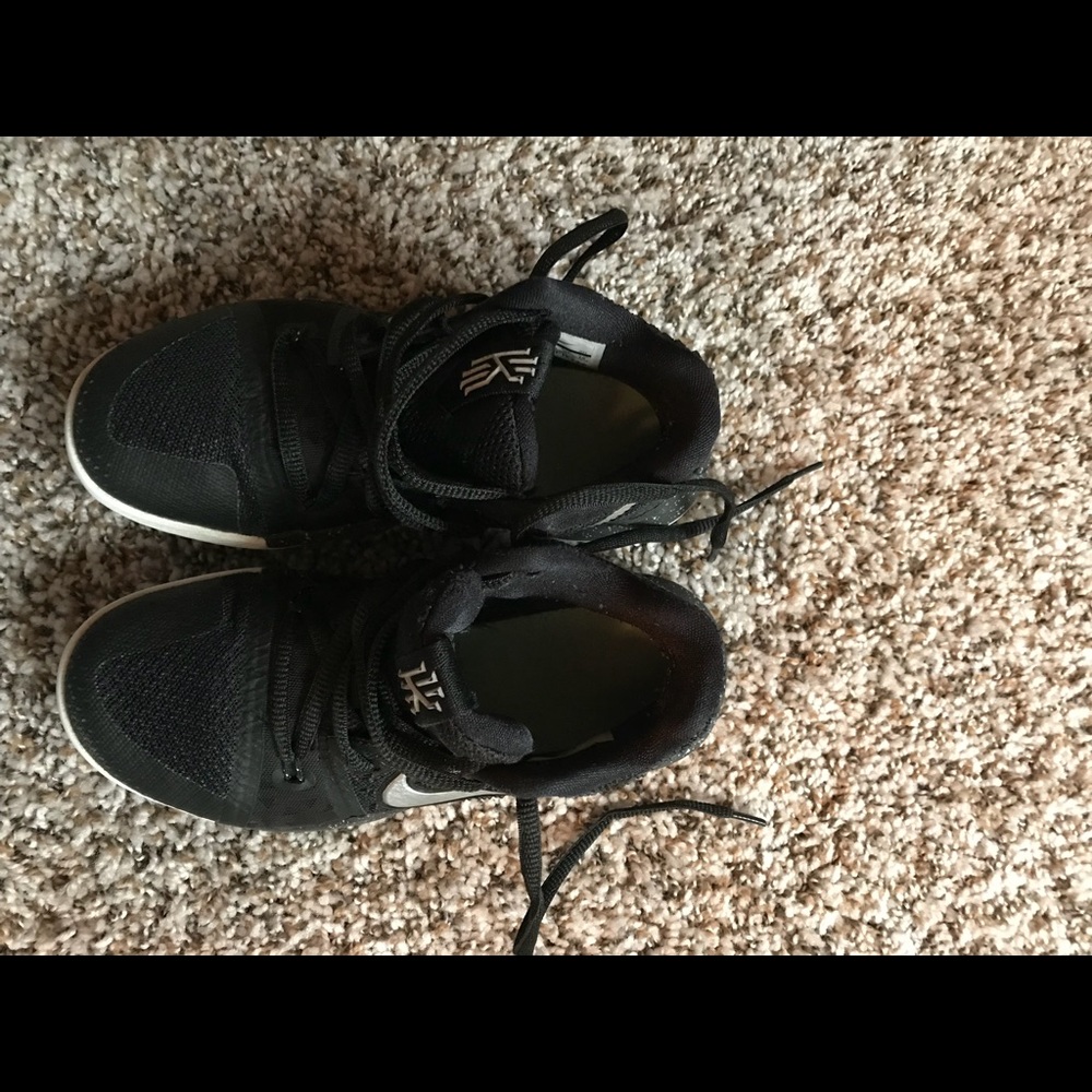 Little boys black Nike’s.